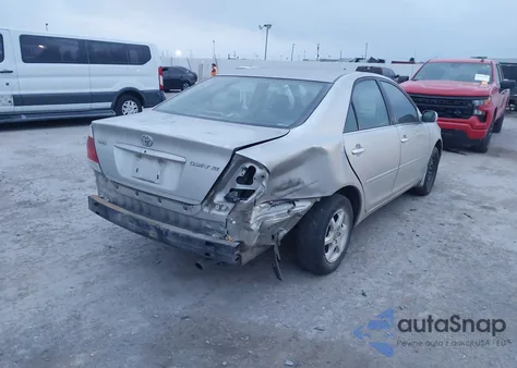 2005 Toyota Camry Xle z USA, uszkodzony, nr VIN 4T1BE32K65U012952